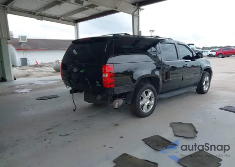 2011 Chevrolet Suburban 1500 Lt1 из США, поврежденный, VIN 1GNSCJE07BR402263